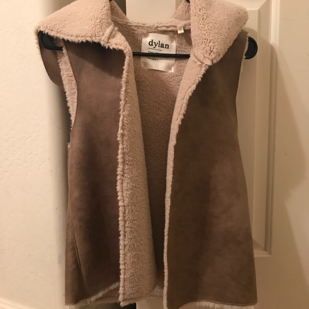 Cute and cozy tan vest.